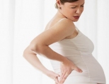 Болит поясница при беременности: причины, как лечить?